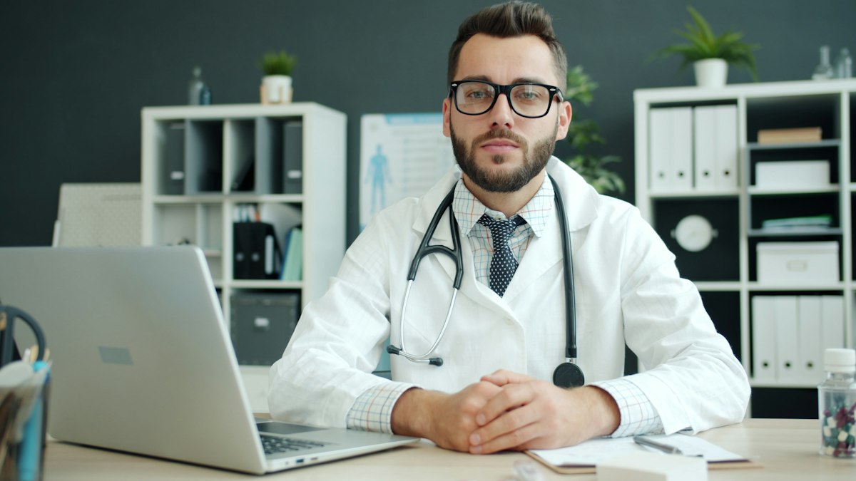 A doctor at a desk